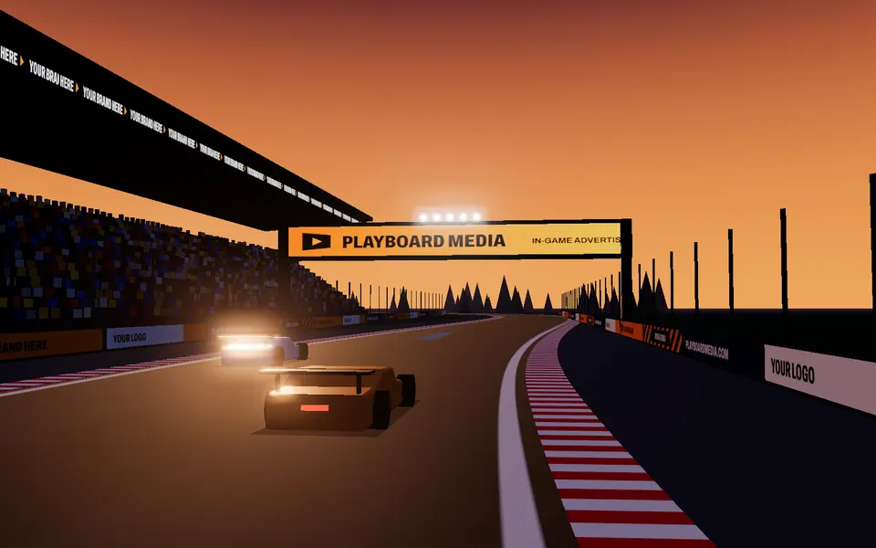 Racing game at sunset with an LED start gantry, trackside banners and a grandstand fascia